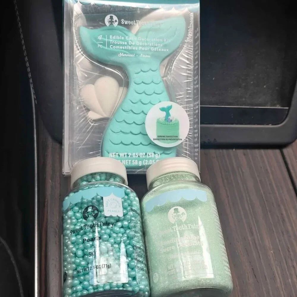 Mermaid birthday cake toppers and sprinkles all new in box unopened. Birthday d